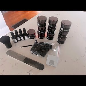 Nail Boo dip kit with 9 colors.